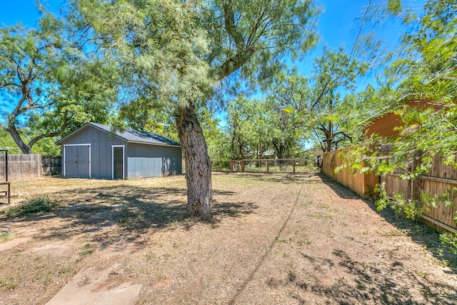 6622 Knickerbocker Rd, San Angelo, TX 76904 - fenced backyard featuring an outdoor structure