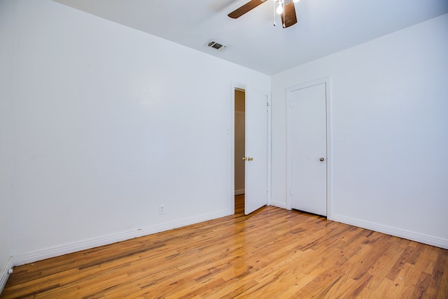 1309 5th Ave, Ballinger, TX 76821 - empty room with light wood finished floors and a ceiling fan