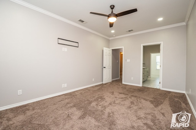 unfurnished bedroom with ensuite bathroom, carpet, crown molding, and ceiling fan