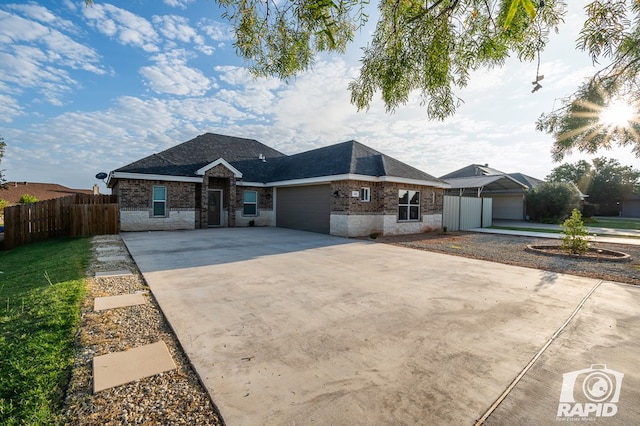 ranch-style home with a garage