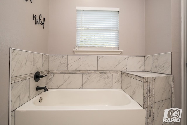 bathroom with a tub