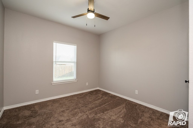 spare room featuring carpet flooring and ceiling fan