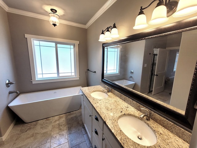 bathroom with ornamental molding, a tub, and vanity