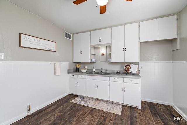 kitchen with sink, dark hardwood / wood-style floors, white cabinets, and ceiling fan