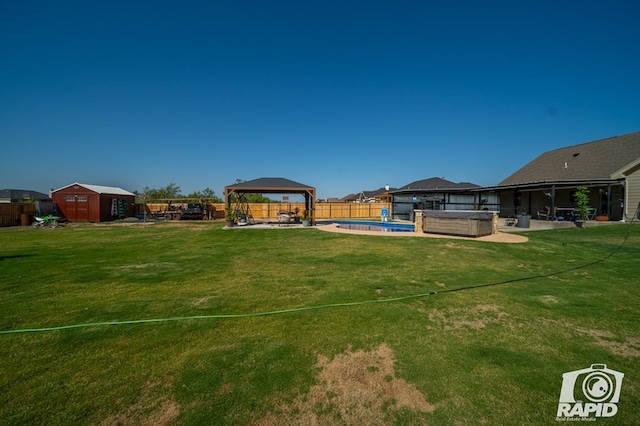 view of yard with a gazebo, a pool, a patio area, and a fenced backyard