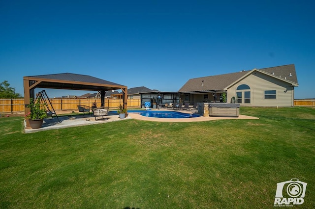 view of yard with a gazebo, a patio area, a fenced in pool, and a fenced backyard