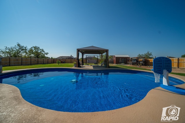 view of pool with a fenced in pool, a gazebo, a lawn, a fenced backyard, and a patio