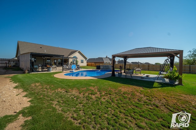 view of swimming pool with a fenced in pool, a gazebo, a lawn, a fenced backyard, and a patio area