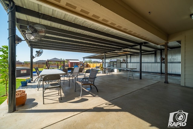 view of patio / terrace featuring a gazebo and fence