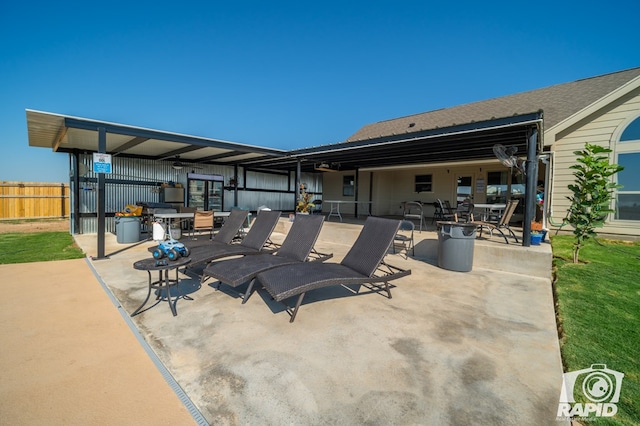 view of patio / terrace featuring outdoor dining space and fence