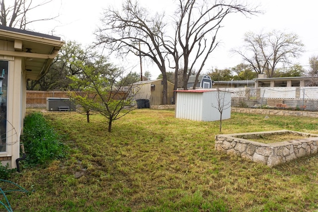 view of yard with a shed and cooling unit