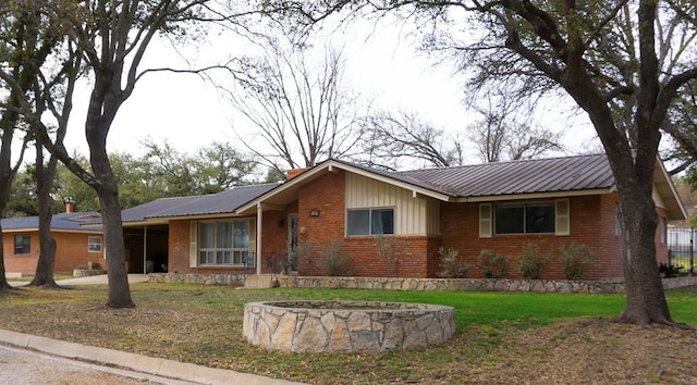 ranch-style house with a front yard