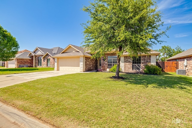3926 Caroline Ln, San Angelo, TX 76904 - view of front of home featuring a garage, concrete driveway, and brick siding