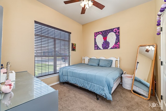 3926 Caroline Ln, San Angelo, TX 76904 - bedroom with carpet and a ceiling fan