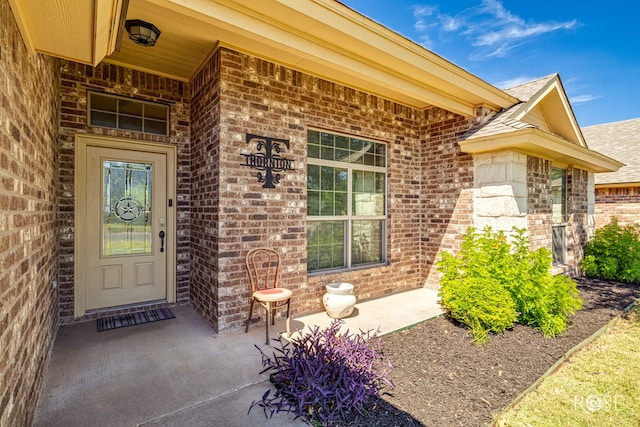 3926 Caroline Ln, San Angelo, TX 76904 - property entrance with brick siding and a porch