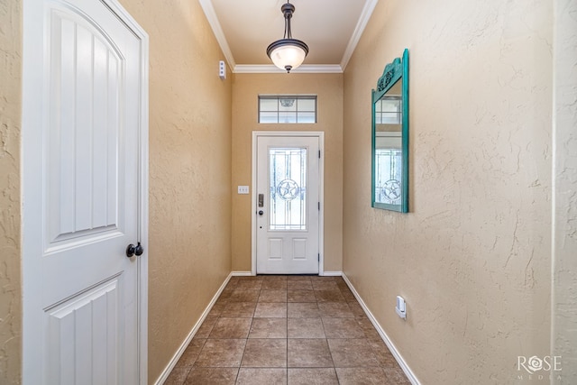 3926 Caroline Ln, San Angelo, TX 76904 - doorway featuring ornamental molding, a textured wall, and stone finish floors