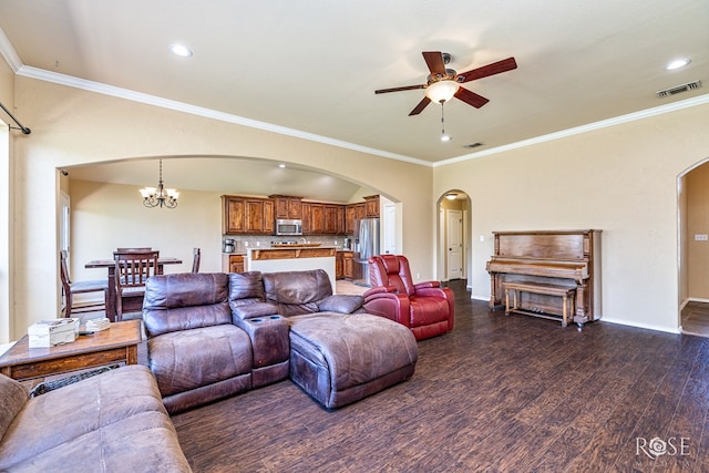 3926 Caroline Ln, San Angelo, TX 76904 - living area featuring arched walkways, ceiling fan, dark wood-style floors, crown molding, and recessed lighting