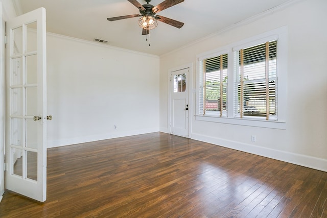 3805 Ogden St, San Angelo, TX 76903 - spare room with crown molding, hardwood / wood-style flooring, a ceiling fan, and baseboards