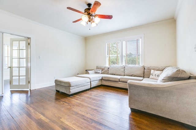 3805 Ogden St, San Angelo, TX 76903 - living room featuring dark wood-style flooring, ceiling fan, ornamental molding, and baseboards