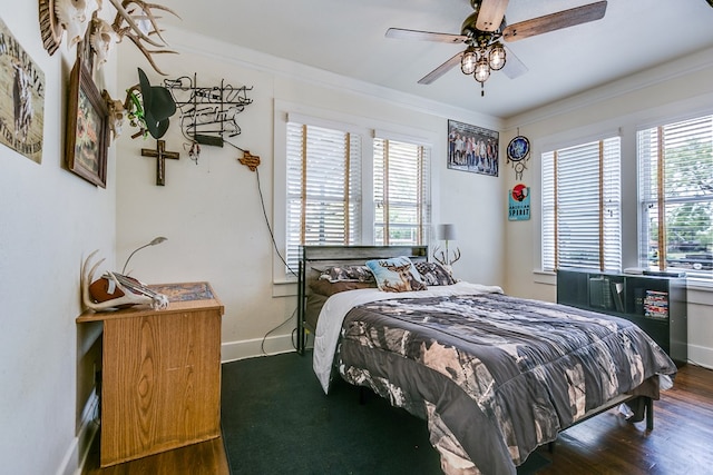 3805 Ogden St, San Angelo, TX 76903 - bedroom with ornamental molding, wood finished floors, baseboards, and a ceiling fan