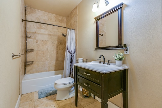 3805 Ogden St, San Angelo, TX 76903 - full bathroom with tile patterned flooring, vanity, toilet, and shower / bath combo