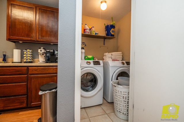2123 Wilson St, San Angelo, TX 76901 - washroom with separate washer and dryer and light tile patterned flooring