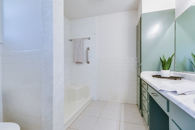 7077 Bean Rd, Wall, TX 76957 - bathroom with vanity, tile walls, tile patterned flooring, and a shower