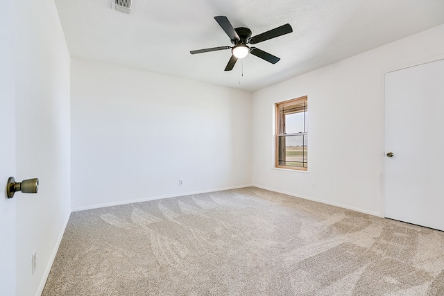 7077 Bean Rd, Wall, TX 76957 - carpeted spare room featuring ceiling fan and baseboards
