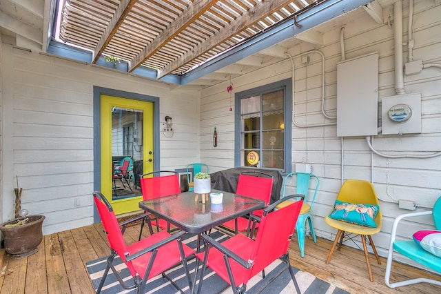 wooden terrace with a pergola