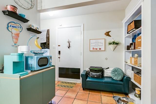 mudroom with light tile patterned flooring