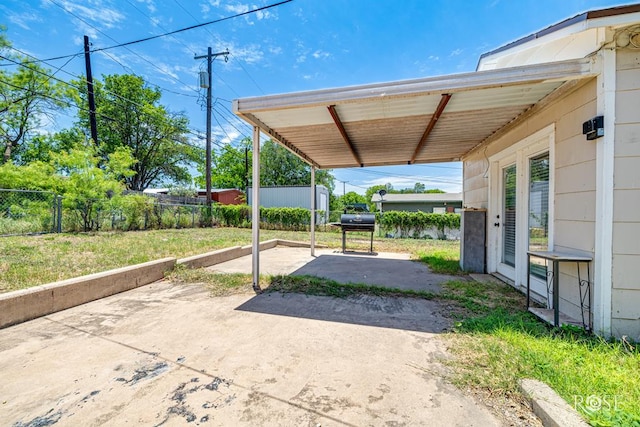 2105 Coleman St, San Angelo, TX 76901 - view of patio with driveway and grilling area