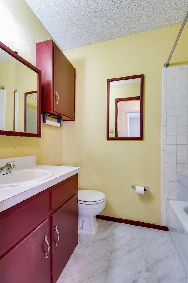 2756 Eunice Dr, San Angelo, TX 76901 - bathroom featuring marble finish floors, a textured ceiling, vanity, and  shower combination