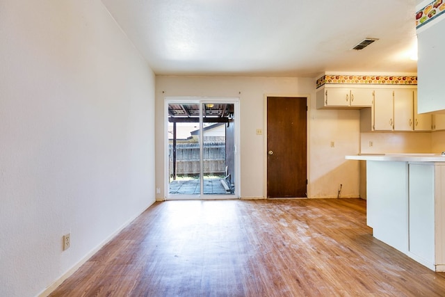 2756 Eunice Dr, San Angelo, TX 76901 - unfurnished living room featuring light wood finished floors