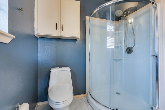 2756 Eunice Dr, San Angelo, TX 76901 - bathroom featuring a shower stall, marble look tiles, and a textured wall
