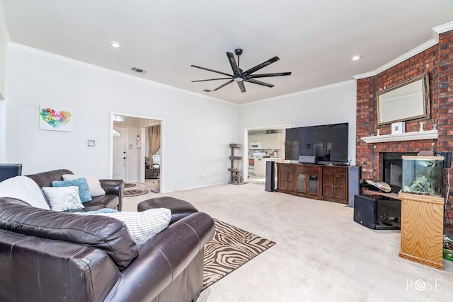 carpeted living room featuring visible vents, a textured ceiling, and ornamental molding