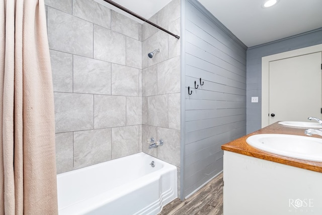 1601 S Jackson St, San Angelo, TX 76903 - bathroom with wood finished floors, shower / bath combo with shower curtain, and double vanity