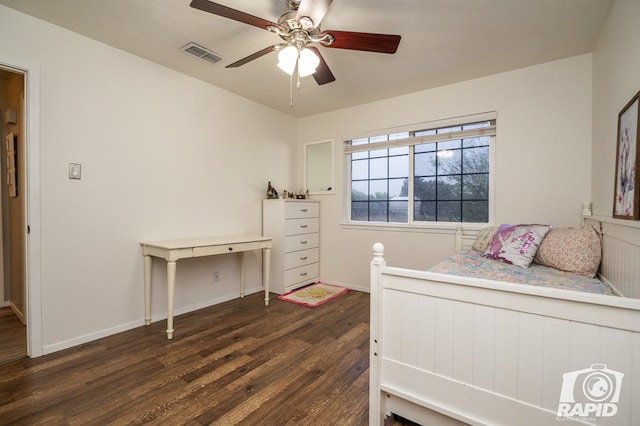 bedroom with ceiling fan, baseboards, dark wood finished floors, and visible vents