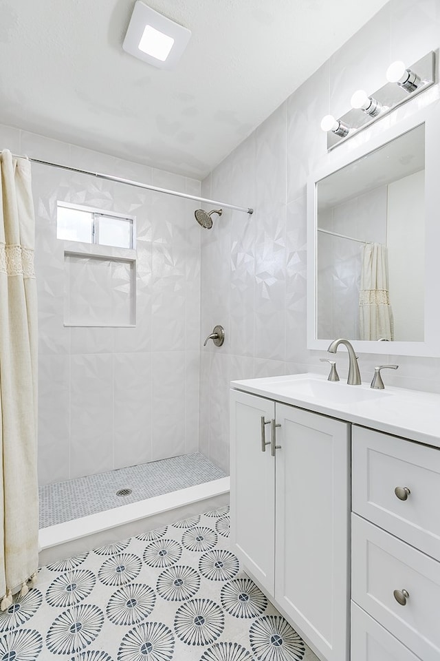 bathroom with vanity and curtained shower