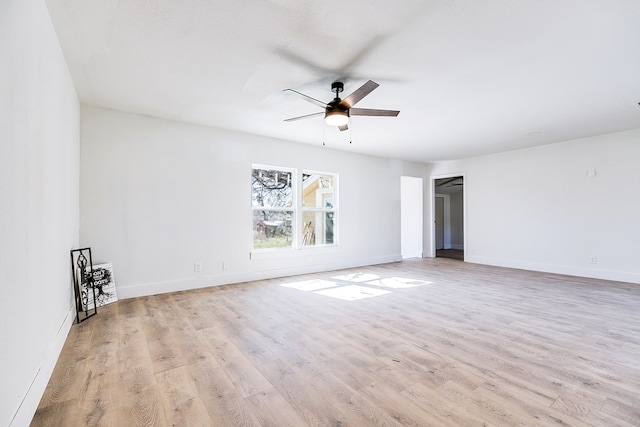 unfurnished room with ceiling fan and light hardwood / wood-style floors