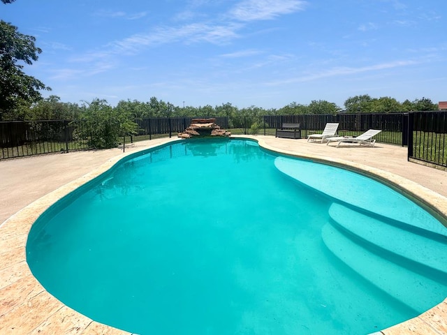 675 Buffalo Ln, San Angelo, TX 76901 - view of swimming pool with a patio area