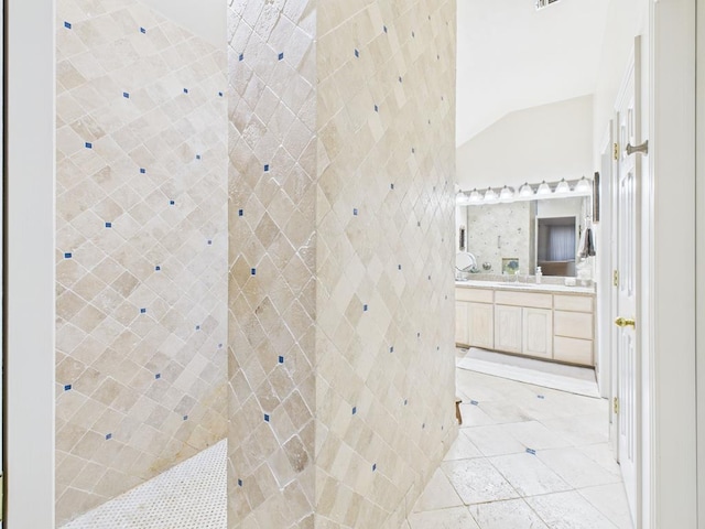 675 Buffalo Ln, San Angelo, TX 76901 - full bathroom featuring vanity and lofted ceiling