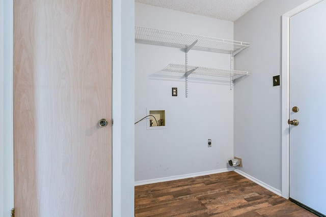 clothes washing area featuring dark wood-style flooring, laundry area, washer hookup, baseboards, and electric dryer hookup