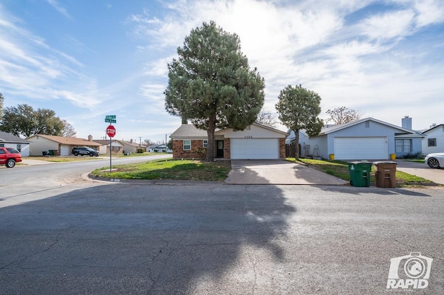 ranch-style house featuring a garage