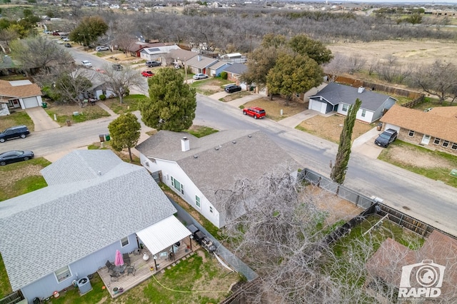 birds eye view of property with a residential view