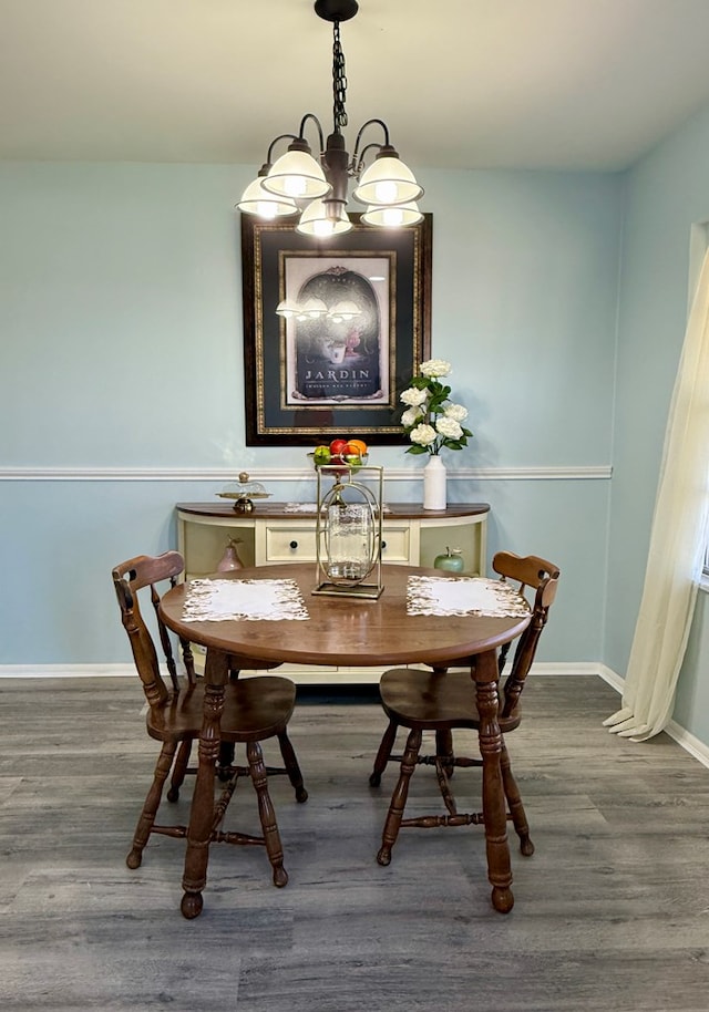 dining room featuring dark hardwood / wood-style flooring