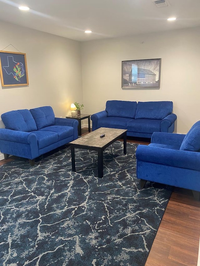 living room with dark wood-type flooring