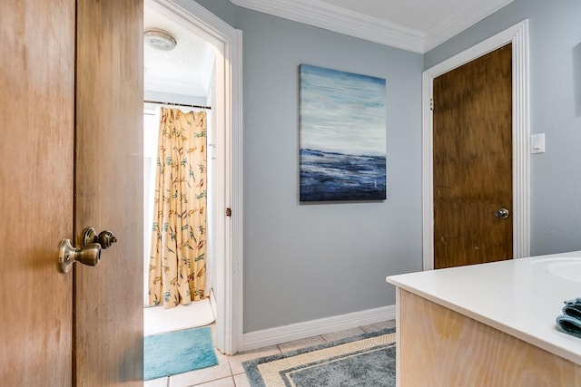 3626 Willowbrook Dr, San Angelo, TX 76904 - bathroom with baseboards, ornamental molding, a shower with shower curtain, tile patterned floors, and vanity