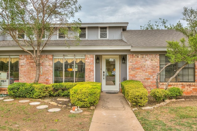 3626 Willowbrook Dr, San Angelo, TX 76904 - view of front facade featuring brick siding and roof with shingles