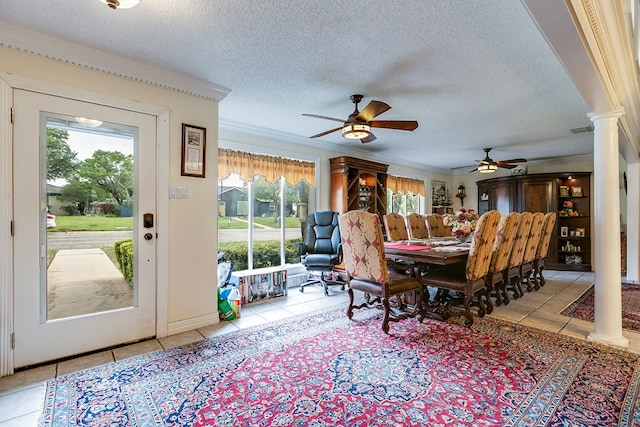 3626 Willowbrook Dr, San Angelo, TX 76904 - dining room with a ceiling fan, tile patterned floors, and decorative columns