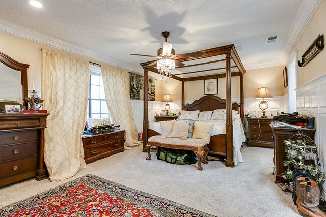 3626 Willowbrook Dr, San Angelo, TX 76904 - carpeted bedroom with wainscoting, crown molding, and visible vents